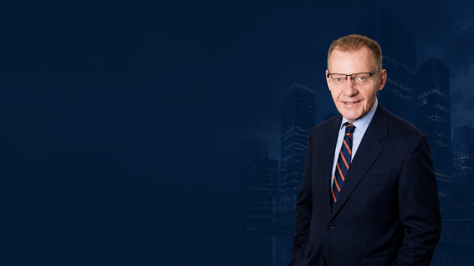 Michael J. Swanson KC against a dark Calgary city skyline